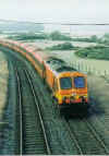 Train approaching Moore's Bridge from Kildare station.