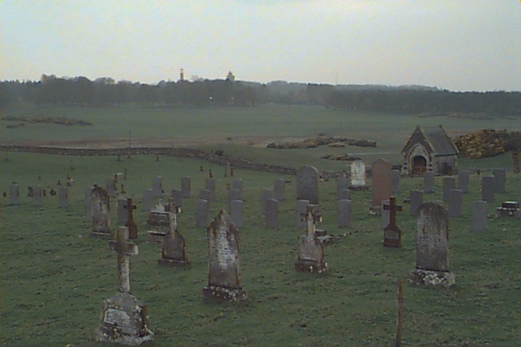 Inside the Cemetery with the Water Tower on the Horizon